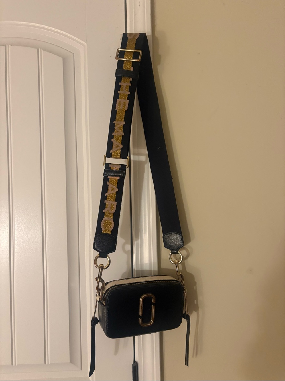 Marc Jacobs Black Crossbody Camera Bag with Gold Hardware and Branded Strap